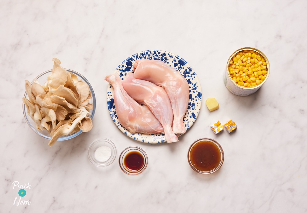 The ingredients for Pinch of Nom's Chicken, Mushroom and Sweetcorn Soup are set out on a kitchen counter, ready to begin cooking.