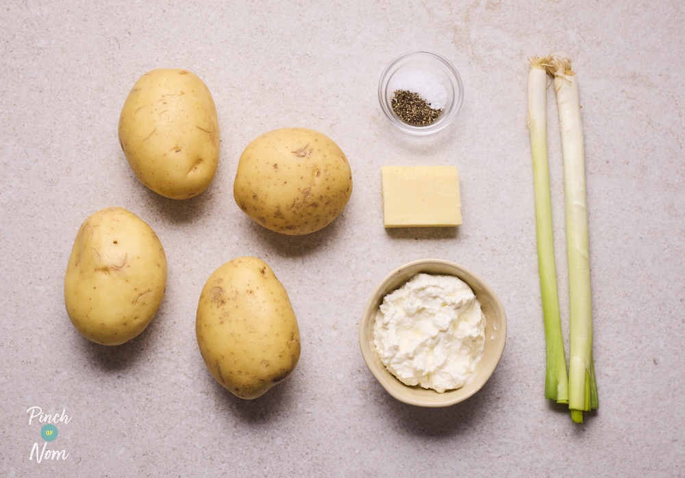 Ingredients for Pinch of Nom Loaded Potato Skins laid out on counter.