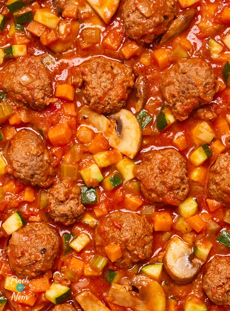 A close-up of the meatballs, vegetables and rich, indulgent-tasting sauce in Pinch of Nom's Meatball Marinara recipe.