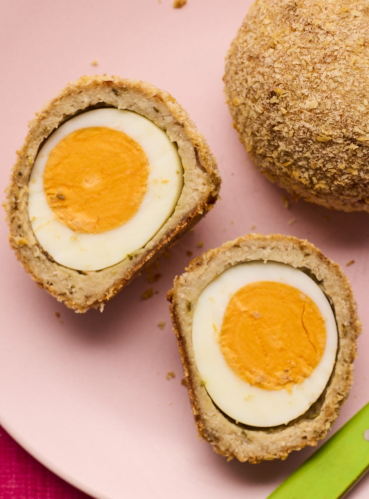 Pinch of Nom Vegetarian Scotch Egg, plated up and sliced in half.