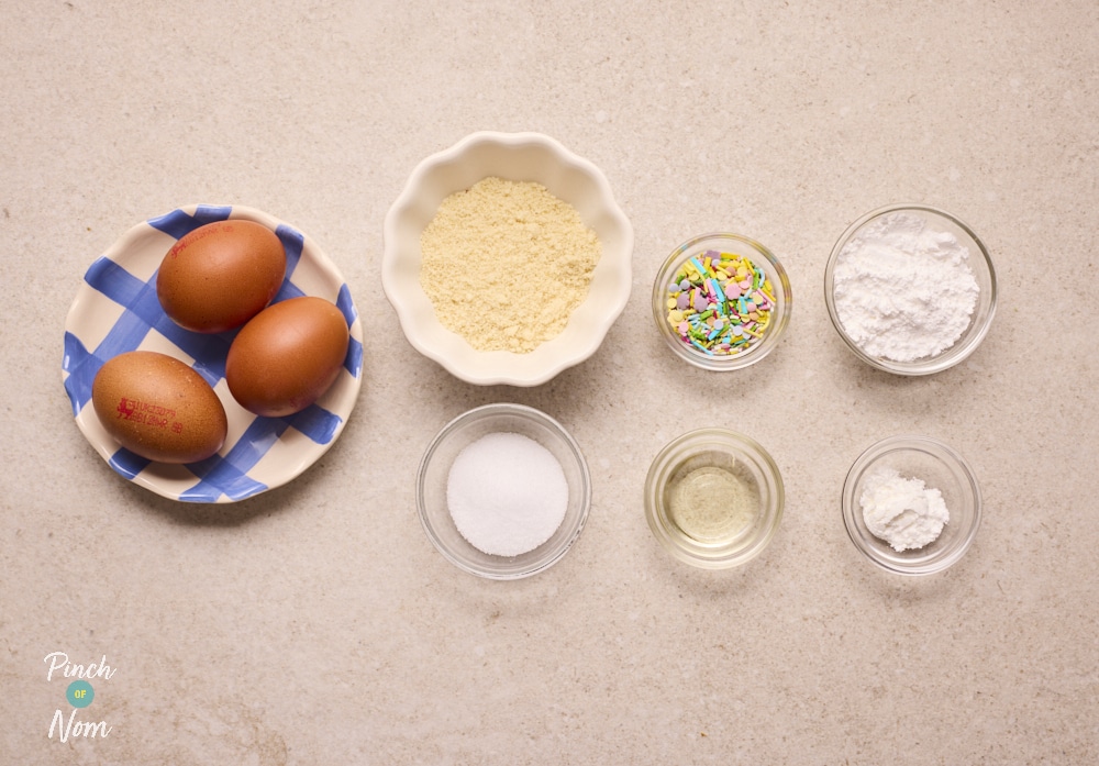 Ingredients for Marzipan Easter Eggs laid out on counter.