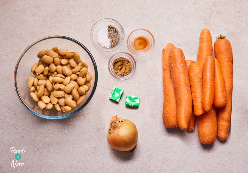 Ingredients for Carrot and Butter Bean Soup laid out on counter.