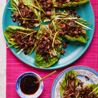 Pinch of Nom's Mongolian Crispy Lamb is ready to eat! Inside lettuce wraps, the crispy lamb is smothered with hoisin sauce and shredded spring onion.