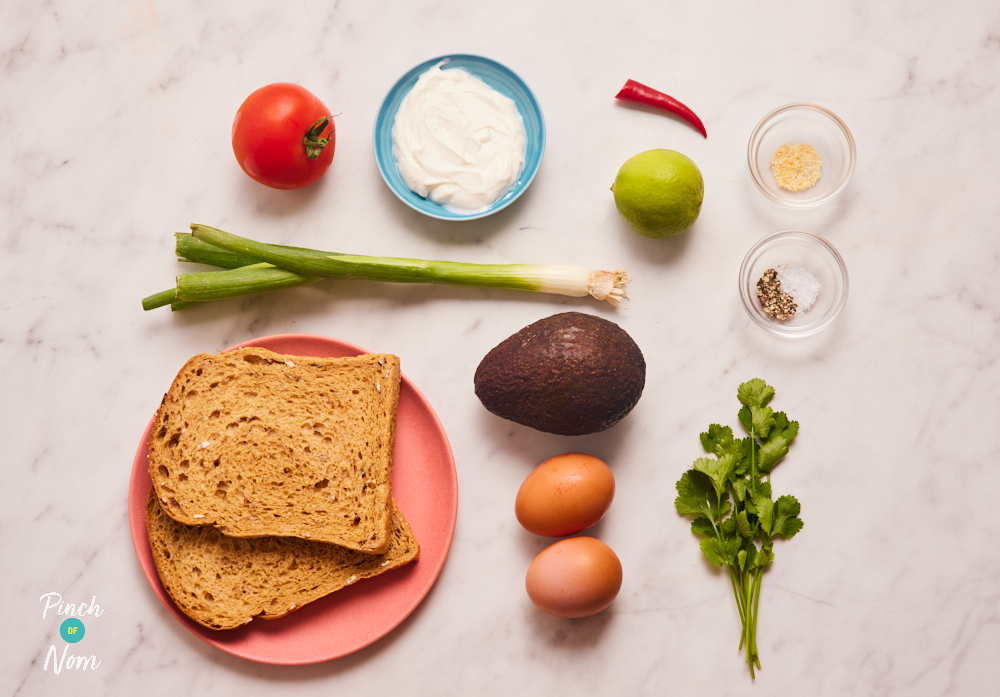 The uncooked ingredients for Pinch of Nom's easy brunch recipe Tex Mex Toast are laid out on a table.