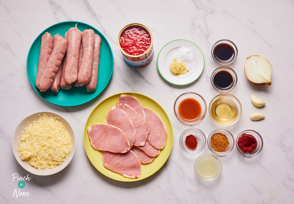 The ingredients for Pinch of Nom's Hunter's Sausage are laid out on a kitchen counter. All the ingredients are measured out, waiting in small glass bowls, ready to begin cooking.