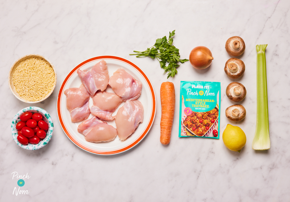 The ingredients for Pinch of Nom X Flava It! Mediterranean-Style Chicken Traybake are laid out on a kitchen surface, ready to begin cooking.