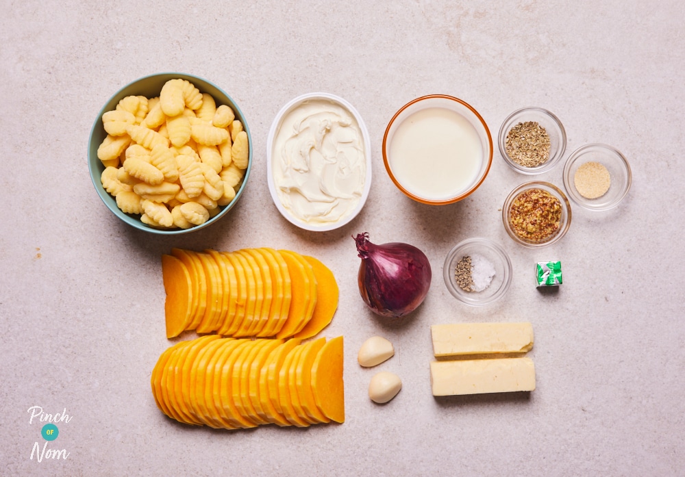 The ingredients for Pinch of Nom's Butternut Squash and Sage Gnocchi are laid out on a kitchen surface, ready to begin cooking.