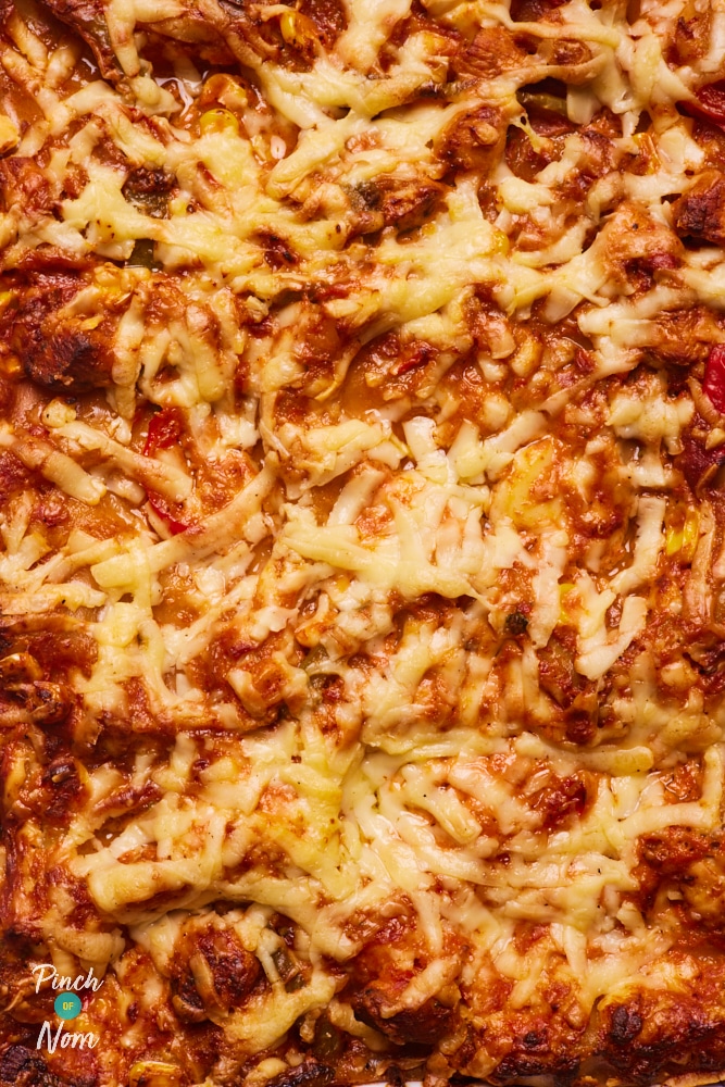 The bubbling cheesy top on Pinch of Nom's slimming-friendly Chicken Fajita Lasagne.