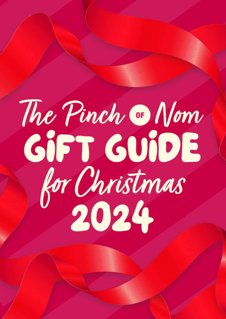 'The Pinch of Nom Gift Guide for Christmas 2024' is presented on a colourful festive background decorated with red ribbon.