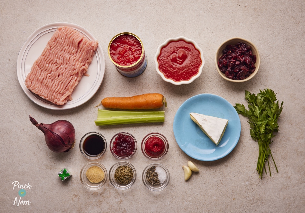 Ingredients for Brie and Cranberry Meatballs laid out on counter.