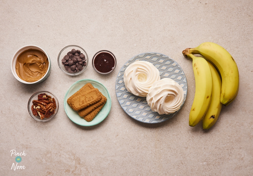 Ingredients for Frozen Biscoff Banana Pudding laid out on counter.