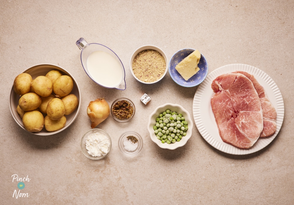 Ingredients for Cheesy Gammon Bake laid out on counter.