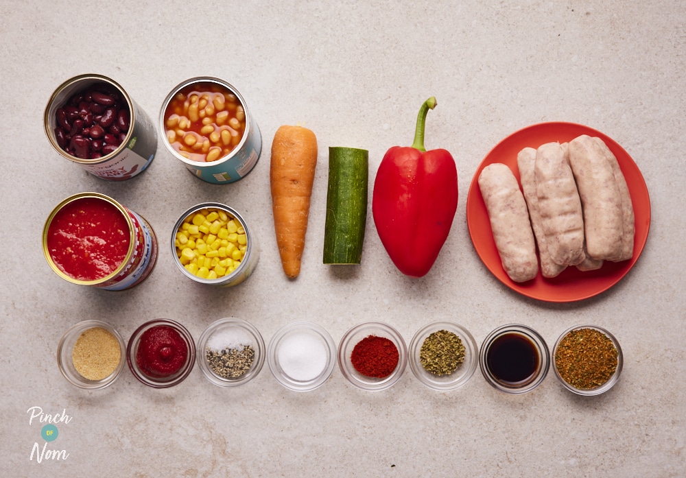 Ingredients for Pinch of Nom BBQ Bean and Sausage Bake laid out on counter.