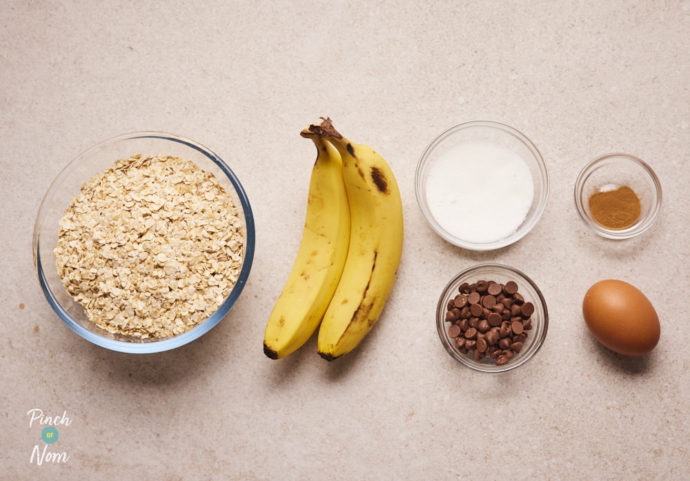 Ingredients for Pinch of Nom Banana Baked Oat Bars laid out on counter.