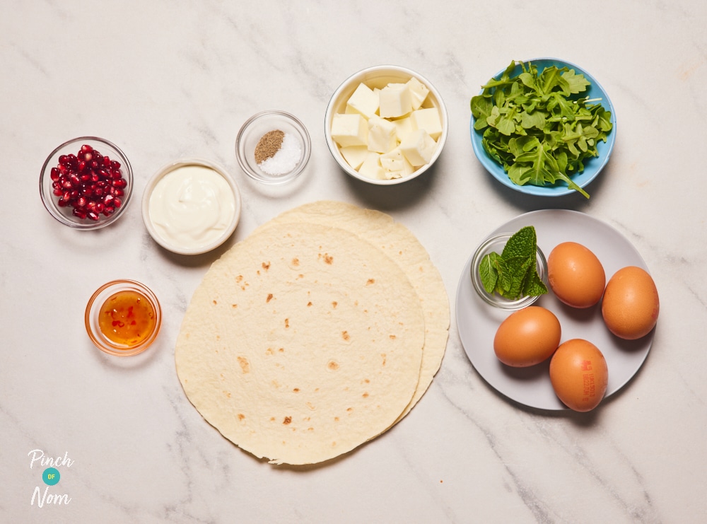 Ingredients for Sweet Chilli Halloumi Omelette Wrap laid out on counter.