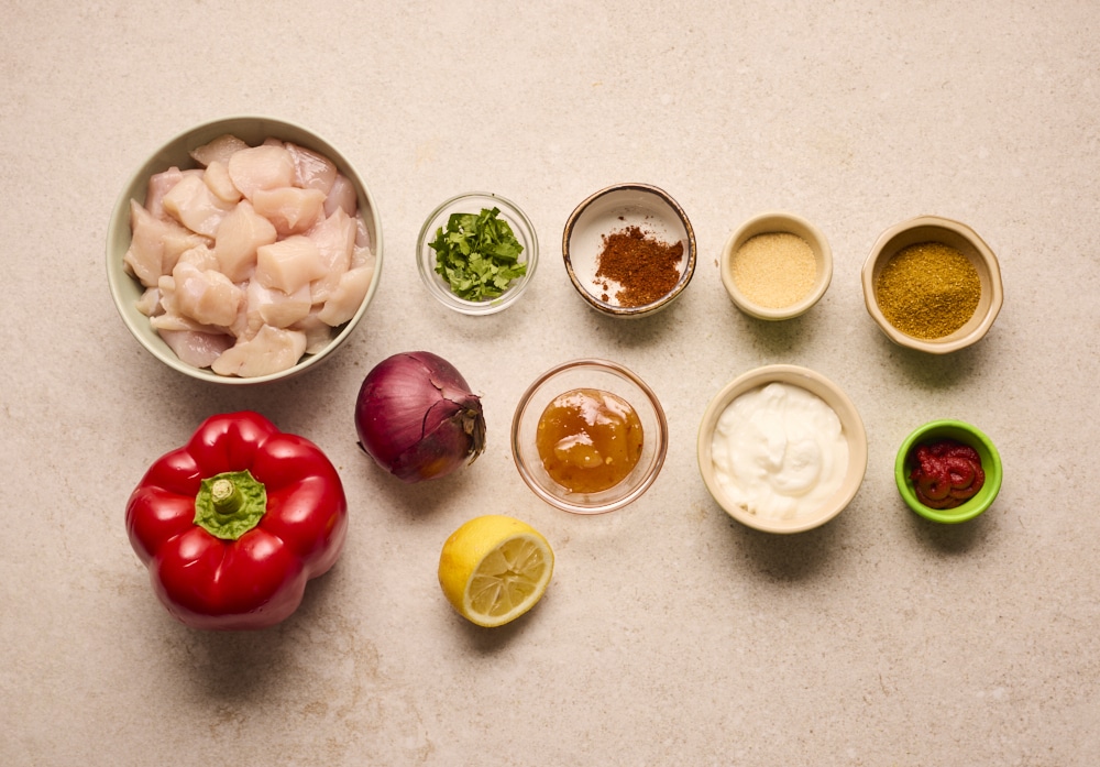 Ingredients for Pinch of Nom Chicken Curry Skewers on counter.